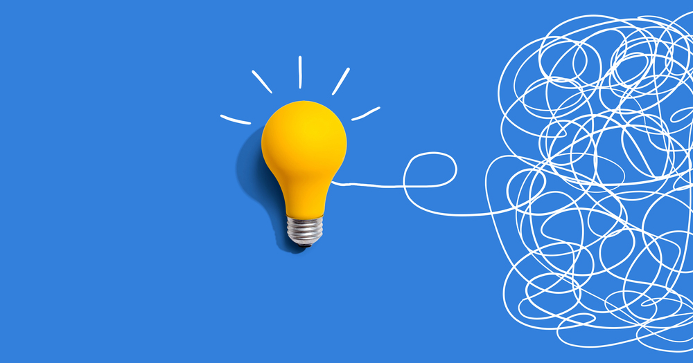 Clarifying complex ideas theme with light bulb