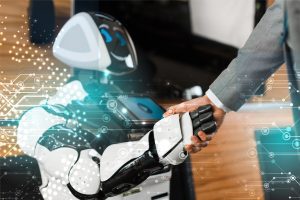 businessman shaking hands with smiling robot after learning about agentic AI marketing