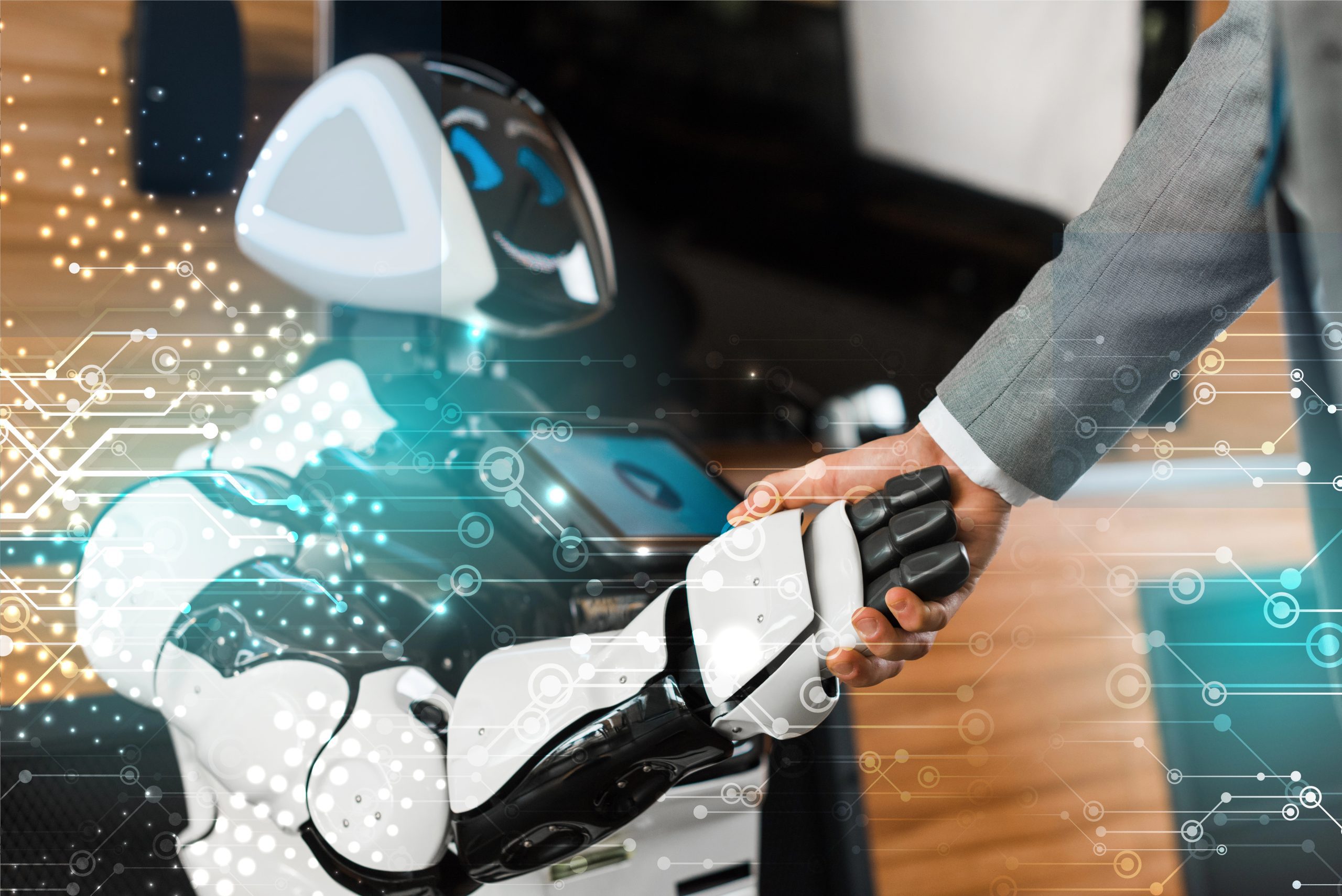 businessman shaking hands with smiling robot after learning about agentic AI marketing