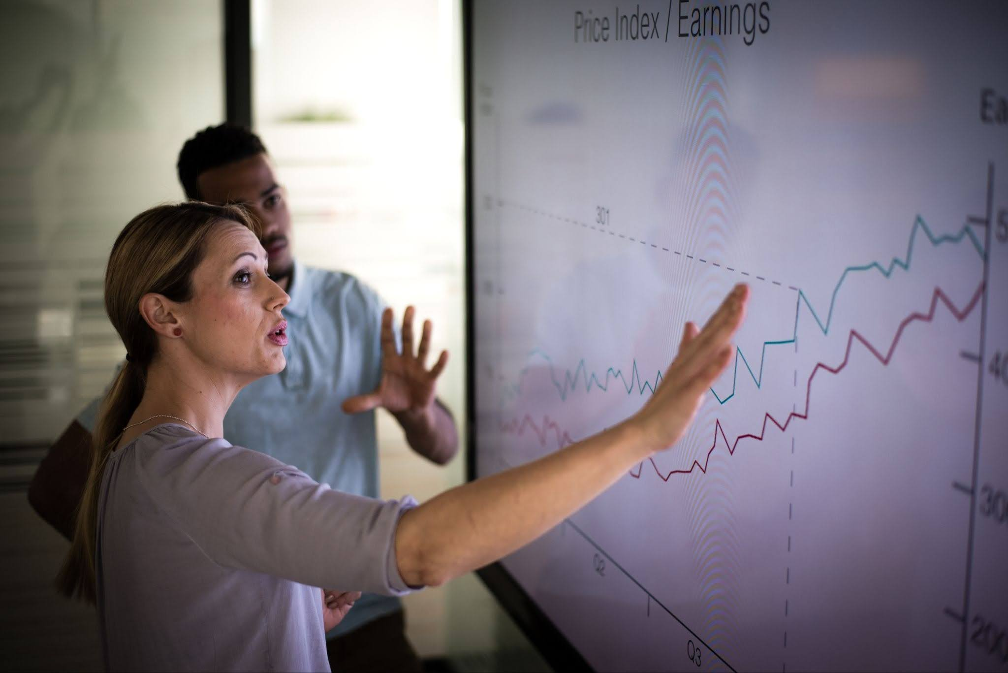 A business woman explaining the company’s growth plan with the data to back it up.